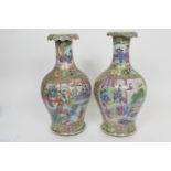 Pair of Canton famille rose vases, early 19th Century, baluster form with a trumpet everted neck,