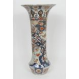 Large Japanese imari trumpet vase, Edo period (late 17th Century), decorated with fish emerging from