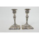 Pair of late Victorian silver candlesticks, maker WL&S, Sheffield 1900, in a classical style with