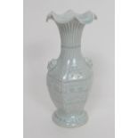 Korean celadon vase, fluted and flared neck and panel moulded body with mask lug handles, height
