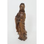 Chinese carved wooden figure of Guanyin, late 19th Century, height 42cm