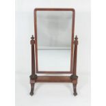William IV mahogany cheval mirror, circa 1835, rectangular plate supported on fluted columns with