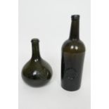 Georgian sealed wine bottle, with applied name 'J. L Stawell', height 27.5cm; also an onion shaped