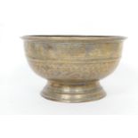 Indonesian bronze footed bowl, 19th Century, stipple engraved with trailing foliage, foliate and