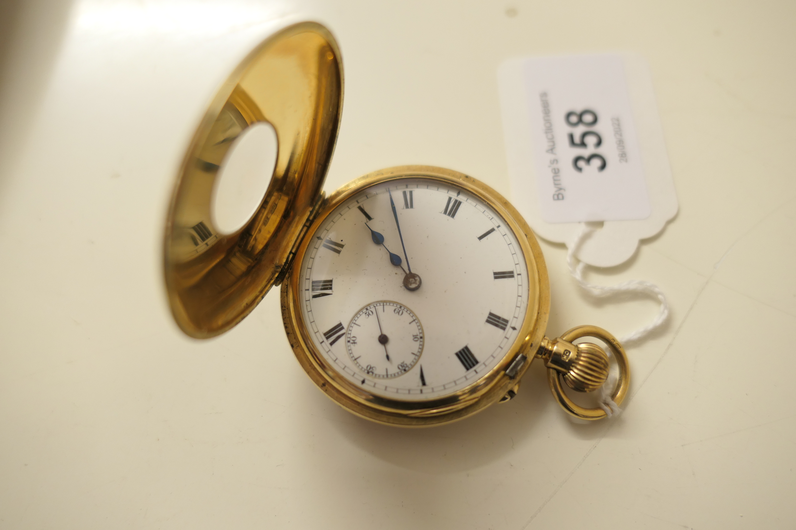 George V 18ct gold half hunter pocket watch, London 1928, outer case with blue enamelled Roman - Image 4 of 7