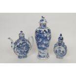 Chinese blue and white wine jug, moon shape decorated with dragons scrolling amidst foliage in