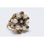 Decorative garnet and cultured pearl dress ring, in 9ct gold, size N, gross weight approx. 7.8g