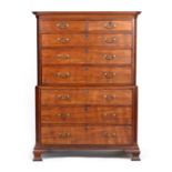 George III mahogany chest on chest, circa 1770, having a dentil and cavetto cornice over two short