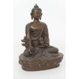Sino-Tibetan bronze Buddha, 19th Century, seated in dhayasana, the left hand holding a phurba, the
