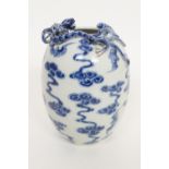 Chinese blue and white ovoid vase, late 19th Century, having applied dragon and bat at the