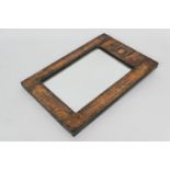 Secessionist style copper framed wall mirror, rectangular bevelled glass plate with beaten copper