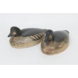 Pair of carved and painted wooden decoy ducks, modelled as Golden Eye ducks, 32cm