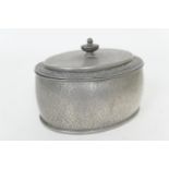Tudric pewter biscuit box for Liberty & Co., hammered oval form inscribed 'Tudric Liberty & Co.',