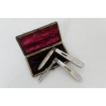 Cased matched Victorian silver and mother of pearl folding fruit knife and fork, makers H&T,