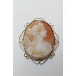 Cameo brooch carved with a profile of Flora, mounted in a 9ct gold wirework frame, 53mm x 48mm
