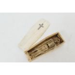 French Napoleonic prisoner of war bone carving of an articulated skeleton in a coffin, 12cm x 4.5cm