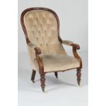 Early Victorian mahogany and upholstered wingback armchair, deep buttoned fabric back, pad arms