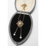 9ct gold aquamarine and seed pearl pendant necklace, flowerhead form centred with a round cut