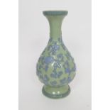 Chinese Republic carved celadon vase, late 20th Century, trumpet baluster form carved with peony