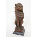 Victorian carved oak lion post finial, mounted on a later base, height 27cm