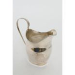 George III silver helmet shaped cream jug, by Peter & Ann Bateman, London 1799, 12.5cm; also a