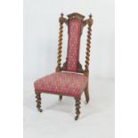 Victorian walnut and upholstered lady's nursing chair, with barleytwist uprights and forelegs,