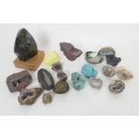Collection of mixed fossils and geological rock and mineral samples including orthoceras fossils,