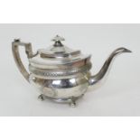 George III silver teapot, by John Bridge, London 1812, oval ogee form with horizontal banded