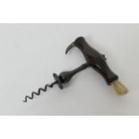 Henshall type button corkscrew, having a rosewood handle with brush and folding cap knife, over a