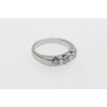 Diamond three stone ring, three well matched round brilliant cut diamonds totalling approx. 0.