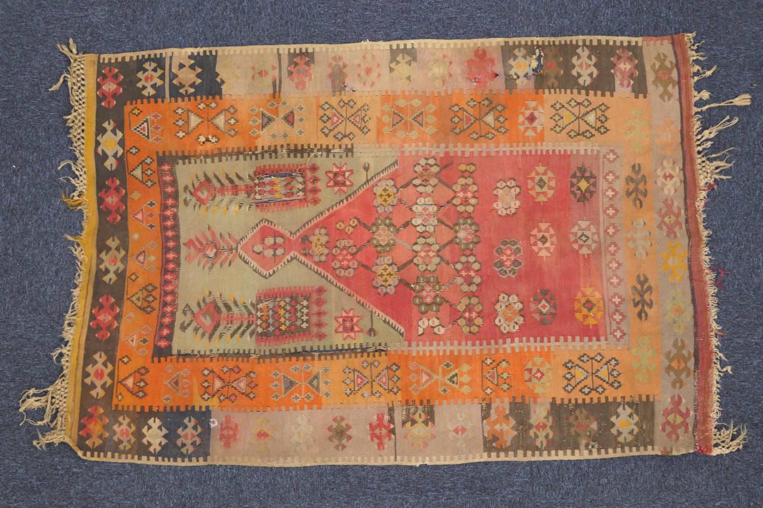 Old kilim flatweave prayer rug, circa 1900, pink and green central mihrab within geometrically