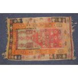 Old kilim flatweave prayer rug, circa 1900, pink and green central mihrab within geometrically