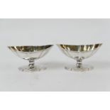 Pair of George III silver table salts, by Abraham Peterson, London 1798, of boat shape, fluted and