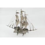 Continental silver plated nef, traditionally worked as a three masted galleon in full sail, raised
