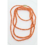 Coral beaded necklace, length approx. 132cm