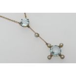 9ct gold aquamarine and pearl pendant necklace, set with two round cut aquamarines, the largest