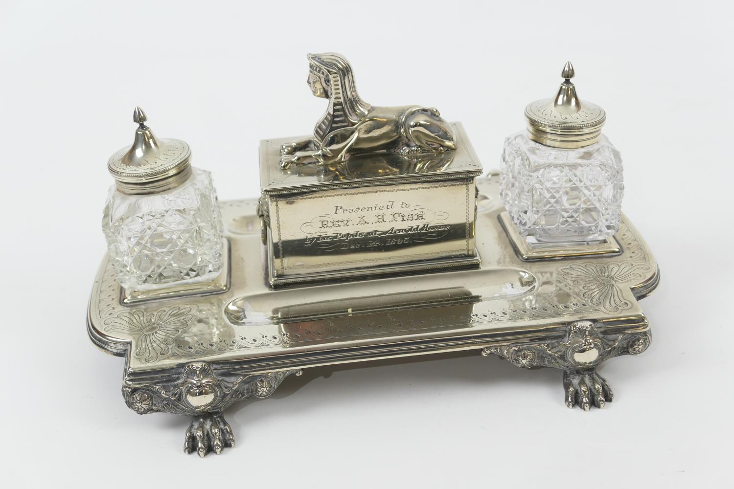 Late Victorian silver plated presentation inkstand, circa 1895, shaped rectangular stand