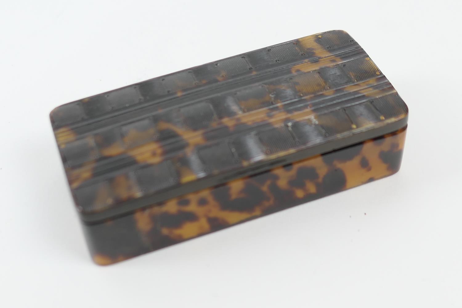 Tortoiseshell snuff box, early 19th Century, rectangular form, the cover pressed with chequerboard