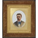 Late Victorian School, Portrait of a gentleman in a blue cravat, oil on milk glass panel, oval,