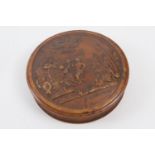 Pressed burr wood circular snuff box, 19th Century, the cover decorated with a scene of revellers,