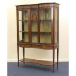 Late Victorian Sheraton Revival double bow fronted display cabinet, circa 1890, having a frieze