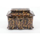 Regency tortoiseshell tea caddy, circa 1815-25, shaped sarcophagus form with caddy lids intact,