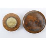 Burr wood circular snuff box, inset with a gilt floral basket disc and lined with tortoiseshell, 7cm