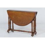 Victorian mahogany Sutherland table, circa 1870, the top with demi-lune drop leaves supported on two