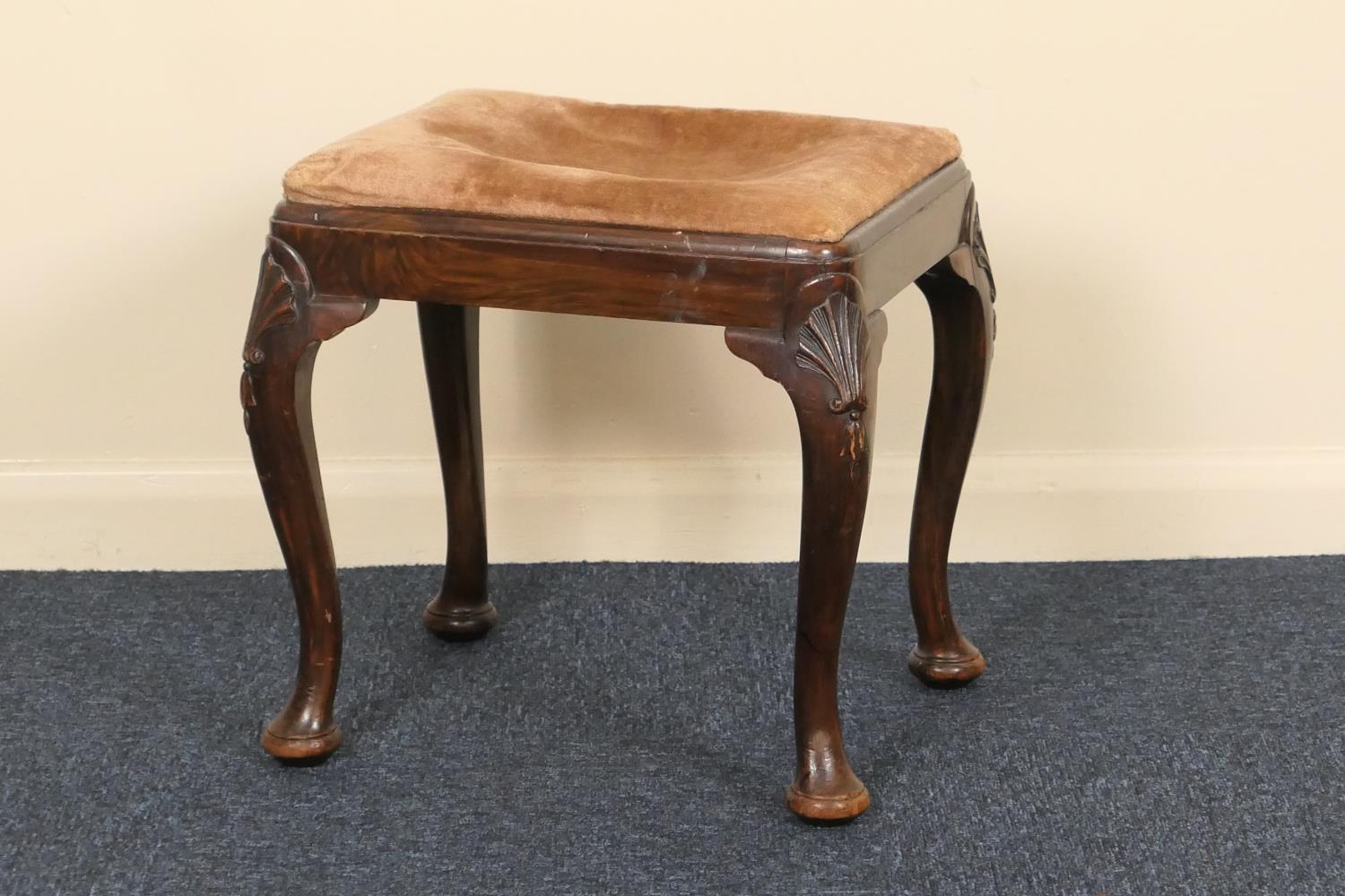 Simulated walnut dressing stool, in the early Georgian style, upholstered pad seat, shell carved