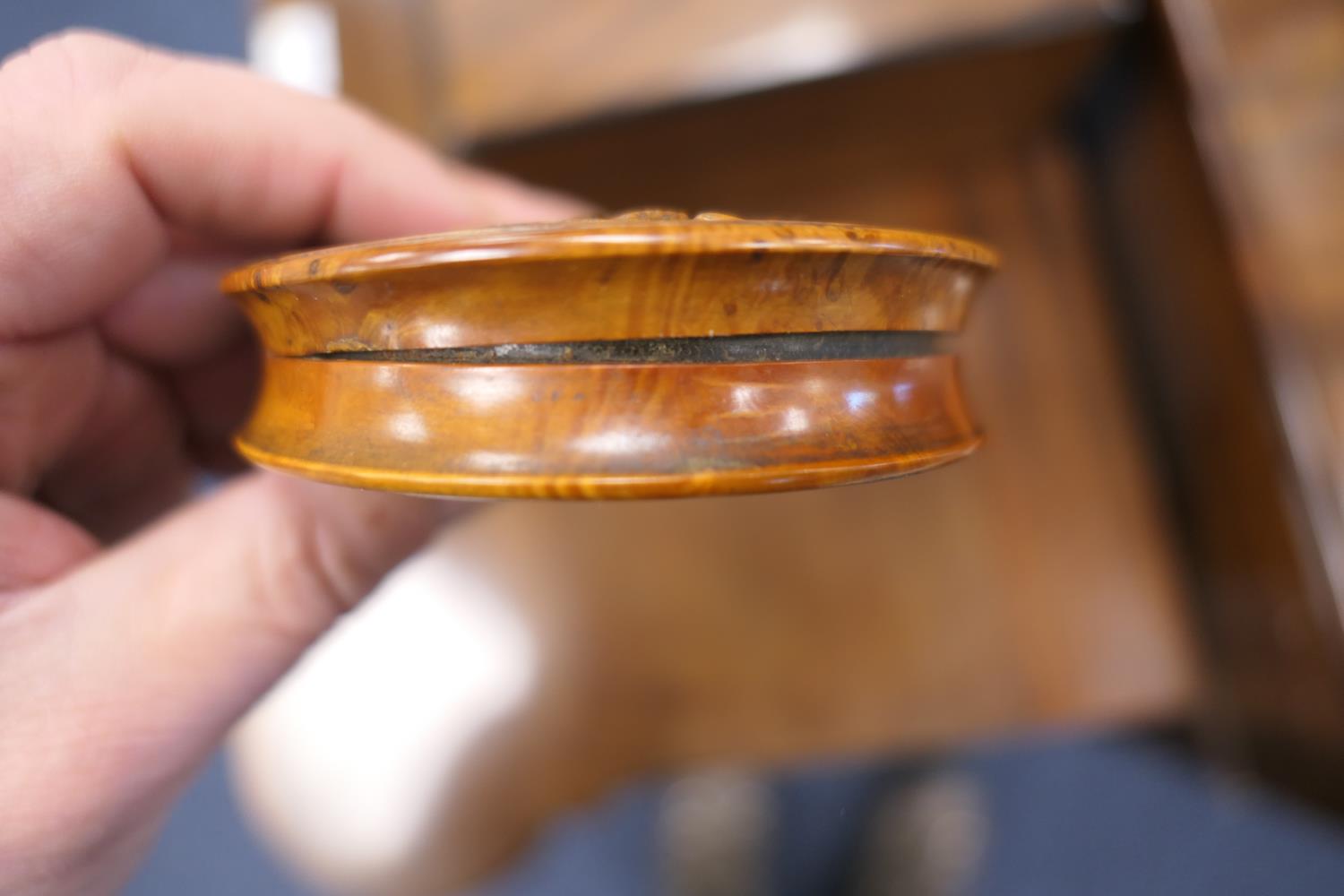 Pressed burr wood circular snuff box, 19th Century, the cover decorated with a scene of revellers, - Image 3 of 7