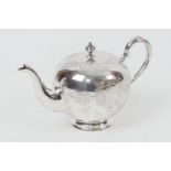 George V silver bachelor's teapot, by S J Levi, Birmingham 1927, of apple shape with a ball