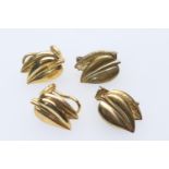 Pair of 9ct gold double leaf form ear clips, 17mm, weight approx. 7.4g; also a pair of similar