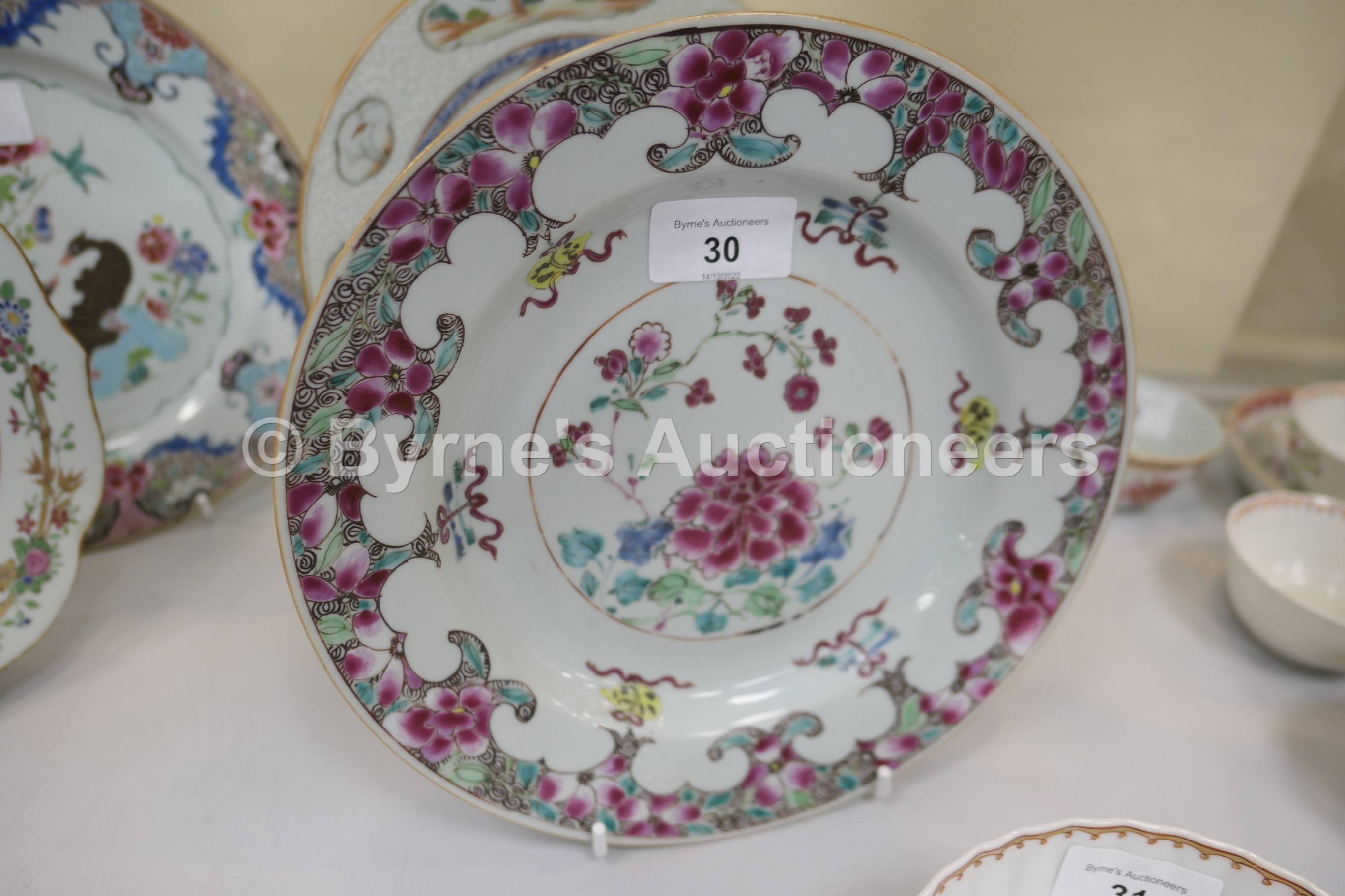 Five Chinese famille rose plates, all 18th Century, including an armorial plate, 22.5cm; Mandarin - Image 4 of 8