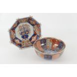 Japanese imari octagonal bowl, Meiji (1868-1912), centred with a basket of flowers within a